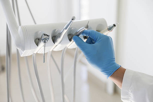 Professional Tooth Extraction technician working in Clay County County, NC